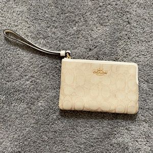 Small never used coach wristlet!